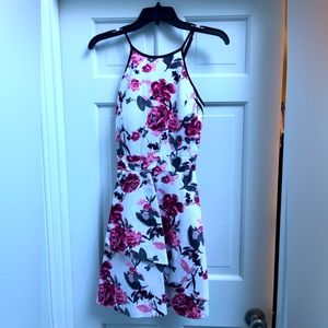Junior size floral sleeveless sundress. Built in padded bra
